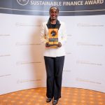 UDB's Managing Director, Patricia Ojangole poses with the Sustainability Leader of the Year Award