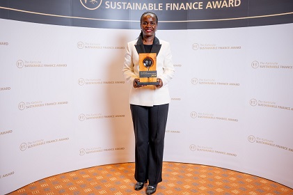 UDB's Managing Director, Patricia Ojangole poses with the Sustainability Leader of the Year Award